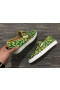 Christian Louboutin Pik Boat Spikes Slip-on Sneakers Logo-Print Canvas Green