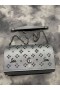 Christian Louboutin Paloma Embreagem de Couro Metalizado e Picos de Prata Christian Louboutin Sacos