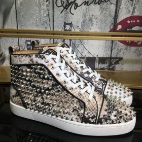 Christian Louboutin Louis Spikes - Buty z wysokiej piszczelą ze skóry Pytona Kolorowego kolor