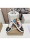 Christian Louboutin tenisice Louis Junior Spikes Orlato antilopa i lakirane kože Boja boja