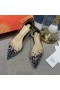 Christian Louboutin Collaclou Pico Plano Claro Adornado de Pvc y charol Negro