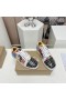 Christian Louboutin Louis Junior Spikes Orlato Sneakers Suede en lakleer Multicolor