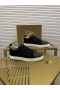 Christian Louboutin Louis Junior Spikes Sneakers aus Leder und Textil Schwarz
