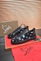 Christian Louboutin Männer, Low-top Sneaker aus Stoff mit Spikes Schwarz CL-Schuhe